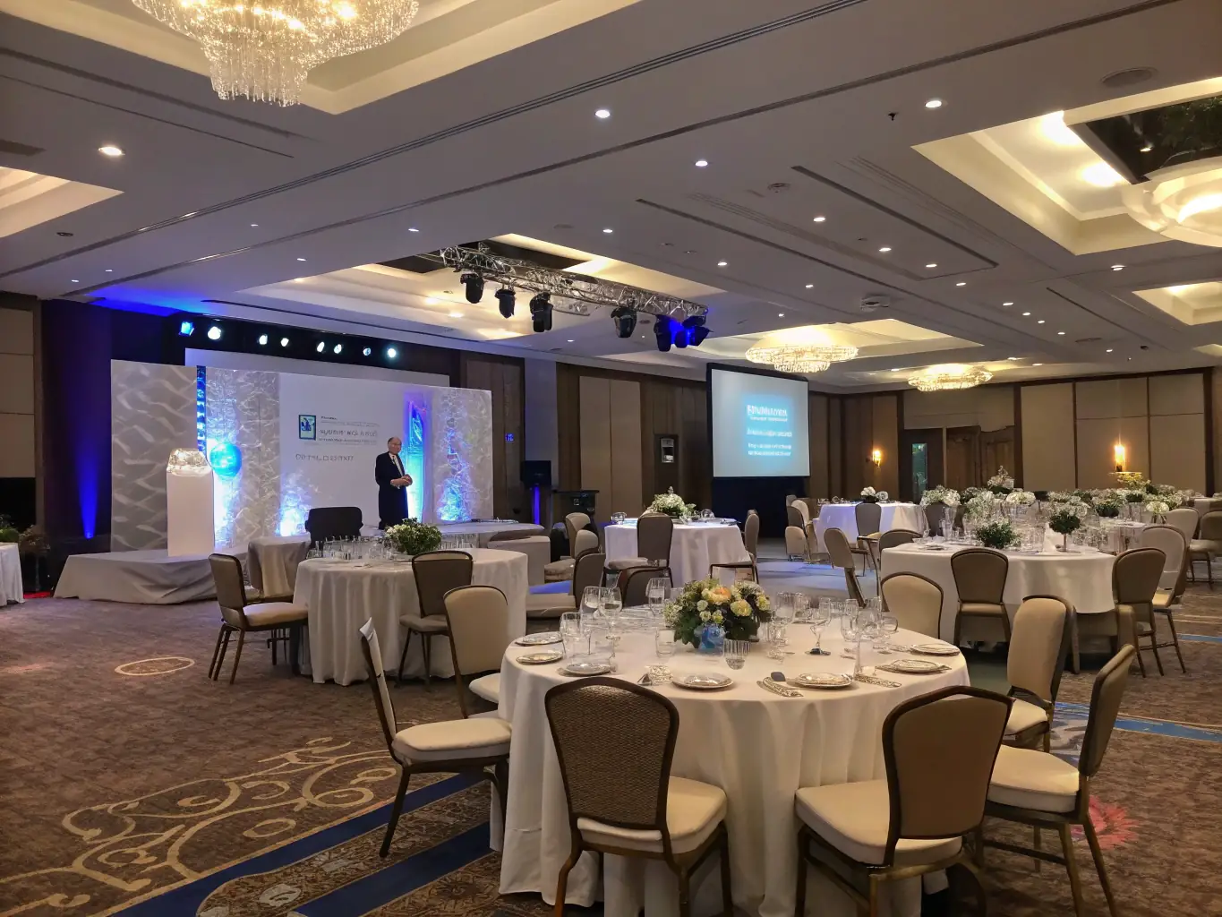 A sophisticated corporate event setup with a stage, professional lighting, and a high-quality sound system, showcasing SoundVision's expertise in corporate event solutions.